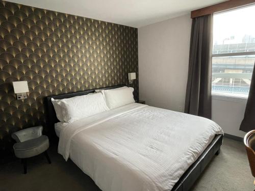 Habitación Estándar - Cama extragrande del hotel Mimosa. Foto 6