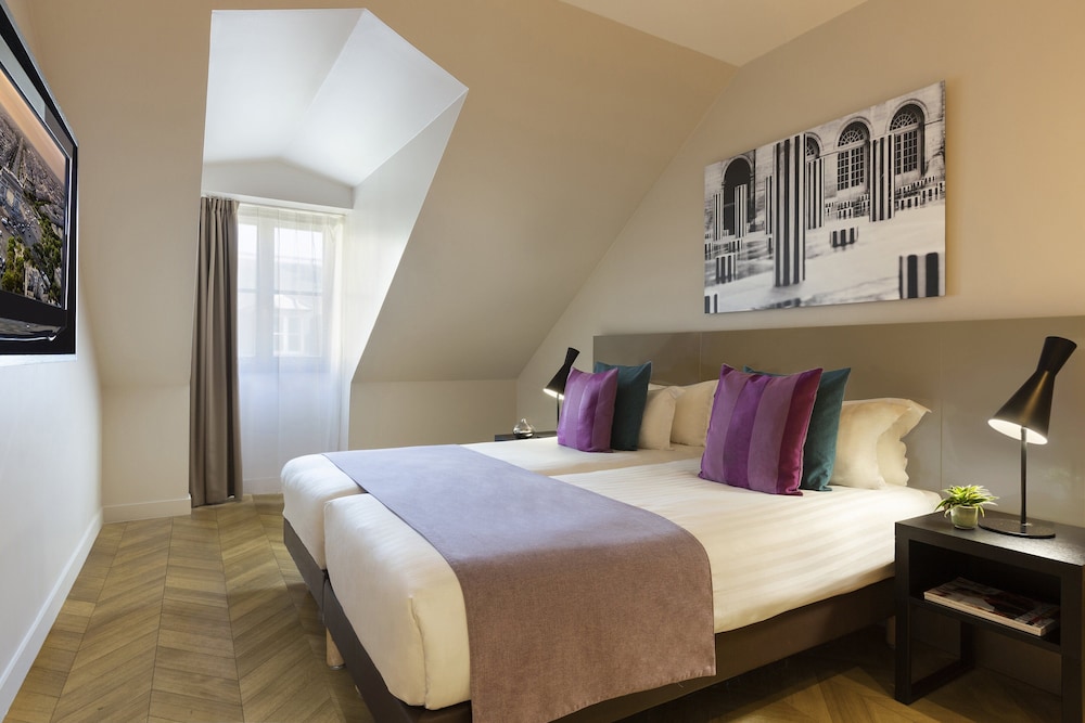 Estudio ejecutivo del hotel Citadines Opéra Paris. Foto 1