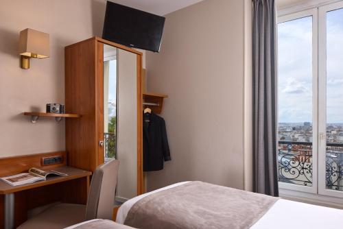 Habitación Doble Superior con vistas a París - 2 camas del hotel Timhotel Montmartre. Foto 2