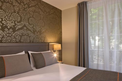 Habitación Doble Confort del hotel Timhotel Montmartre. Foto 4