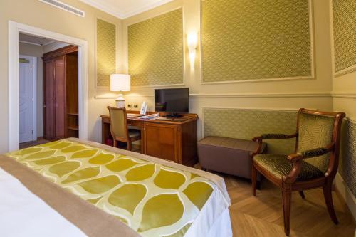 Habitación Doble del hotel Grand Visconti Palace. Foto 1
