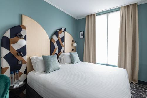 Habitación Doble Estándar del hotel L'hôtel Royal Saint Germain. Foto 12
