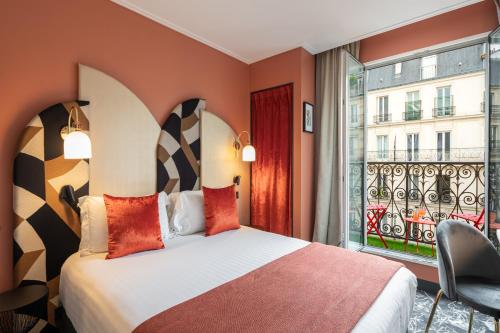 Habitación doble con balcón del hotel L'hôtel Royal Saint Germain