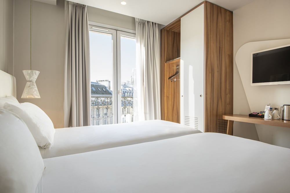 Habitación clásica doble (Avec Balcon) del hotel Magenta 38 By Happyculture. Foto 1