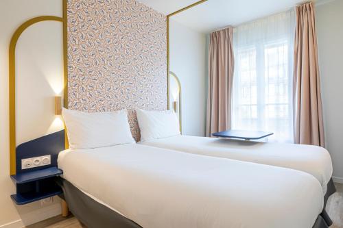 Habitación Doble Estándar - 2 camas del hotel Ibis Styles Paris Eiffel Cambronne. Foto 6