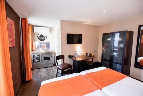 Suite Junior con cocina americana del hotel Pax Opera. Foto 1