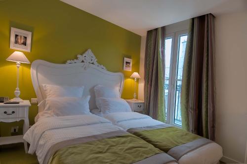 Habitación Doble con balcón - 2 camas del hotel Cluny Square. Foto 4