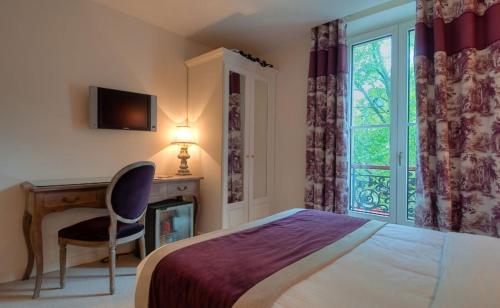 Habitación Doble con balcón del hotel Cluny Square. Foto 1