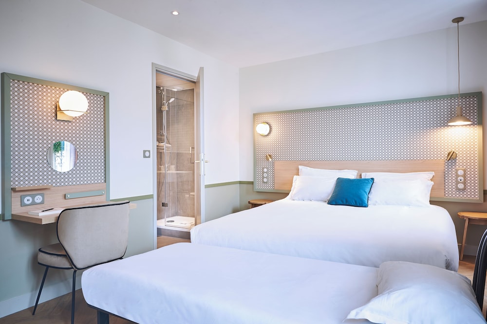 Habitación Triple Premium del hotel Cervantes By Happyculture