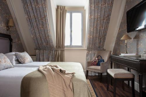 Habitación cuádruple del hotel Serotel Lutèce
