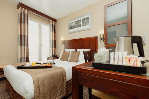 Habitación Doble Estándar del hotel Grand Francais. Foto 1