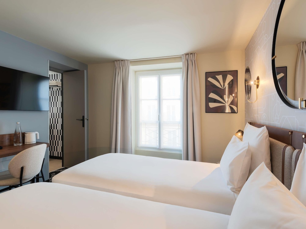 Habitación clásica con 2 camas individuales, 2 camas individuales del hotel Mercure Paris Opera Grands Boulevards. Foto 5