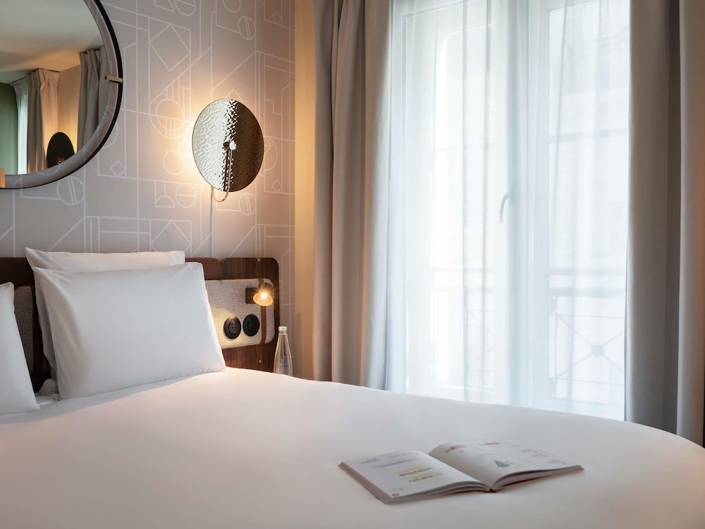 Privilege, Habitación Premium, 1 cama doble con sofá cama del hotel Mercure Paris Opera Grands Boulevards. Foto 4