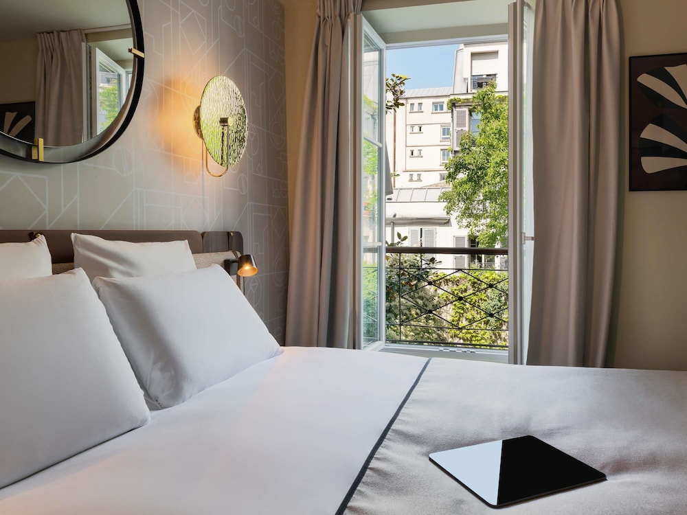 Privilege, Habitación, 1 cama doble del hotel Mercure Paris Opera Grands Boulevards. Foto 3