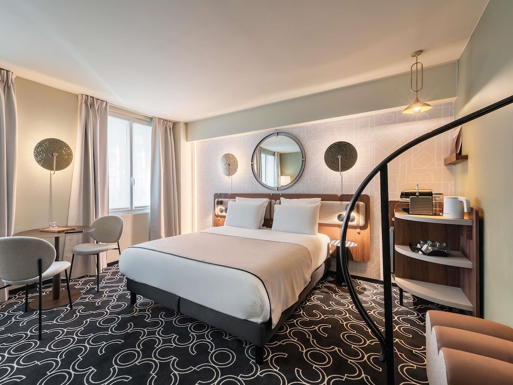 Privilege, Habitación Premium, 1 cama doble con sofá cama del hotel Mercure Paris Opera Grands Boulevards. Foto 8