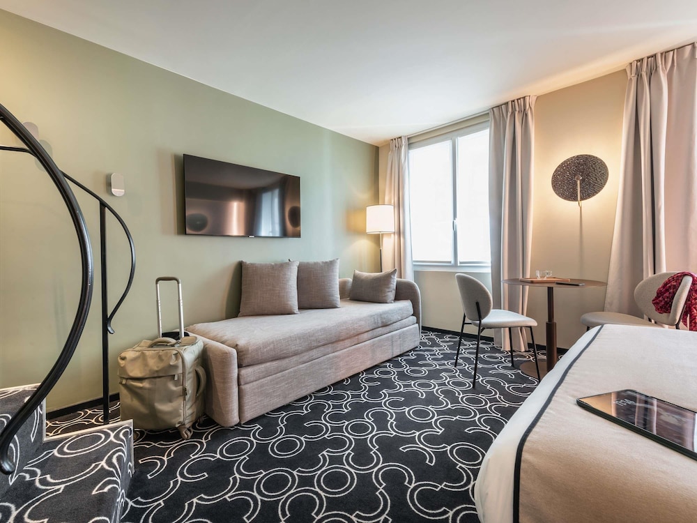 Privilege, Habitación Premium, 1 cama doble con sofá cama del hotel Mercure Paris Opera Grands Boulevards. Foto 10