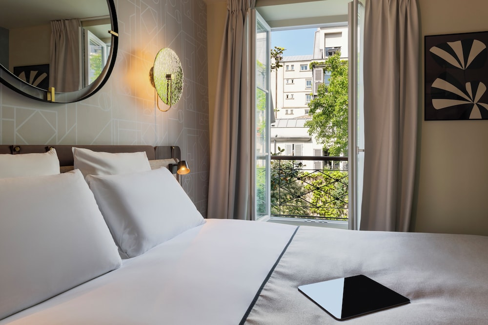 Privilege, Habitación, 1 cama doble del hotel Mercure Paris Opera Grands Boulevards. Foto 7