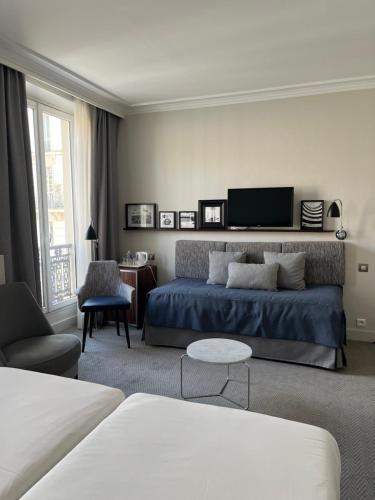 Habitación Triple del hotel Londres Et New York. Foto 2