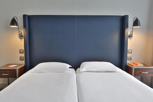Habitación Triple del hotel Londres Et New York. Foto 9