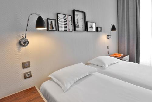 Habitación Triple del hotel Londres Et New York. Foto 13