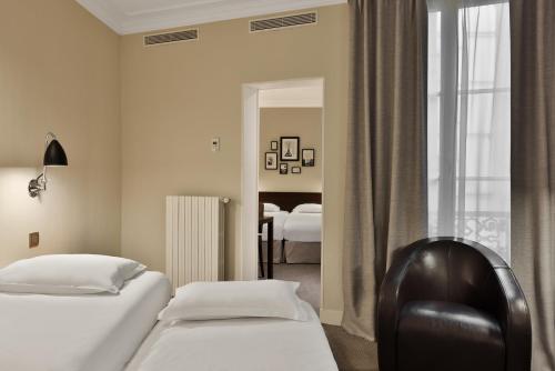 Habitación Cuádruple del hotel Londres Et New York. Foto 8
