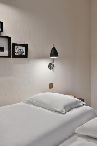 Habitación Cuádruple del hotel Londres Et New York. Foto 10