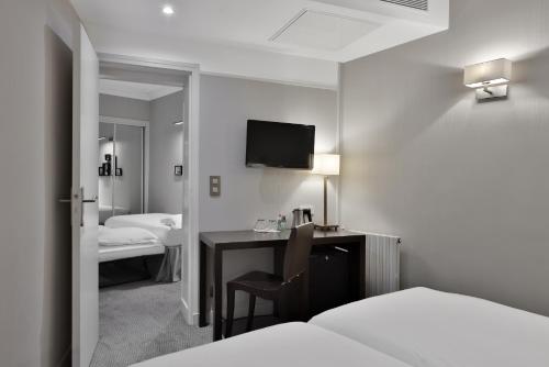 Habitación Cuádruple del hotel Londres Et New York. Foto 11