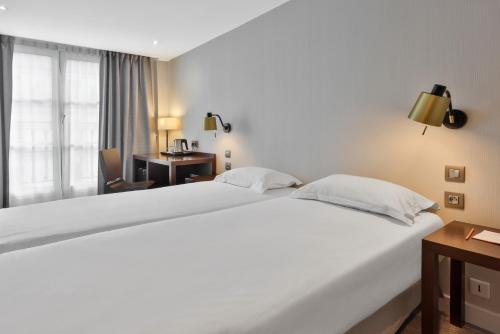 Habitación Doble Estándar - 2 camas del hotel Londres Et New York. Foto 4