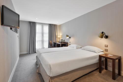 Habitación Doble Estándar - 2 camas del hotel Londres Et New York. Foto 6