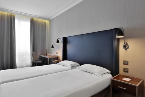 Habitación Doble Estándar - 2 camas del hotel Londres Et New York. Foto 8