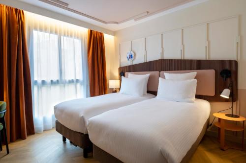 Classic Twin Room - L'Amicale del hotel Urban Hive Paris. Foto 2