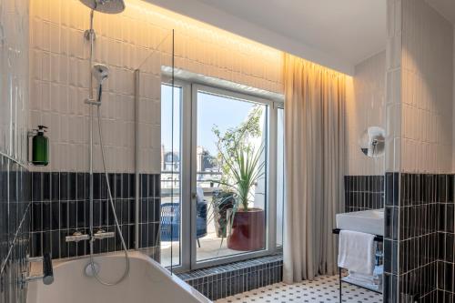 Suite - L'Iconique del hotel Urban Hive Paris. Foto 4