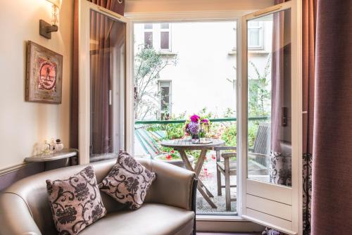 Habitación Doble Deluxe con terraza del hotel Monceau Wagram. Foto 6