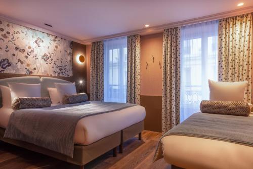 Habitación Triple del hotel Maison Axel Opera. Foto 4