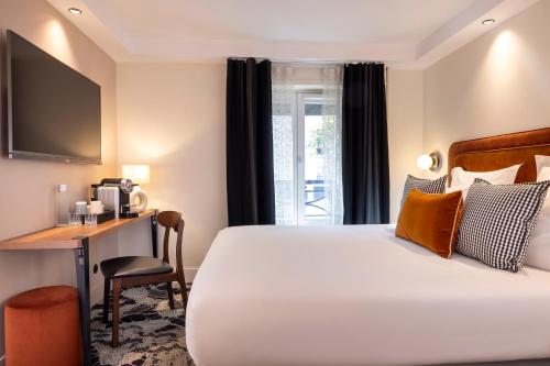 Habitación Doble Clásica del hotel Chavanel Paris. Foto 1