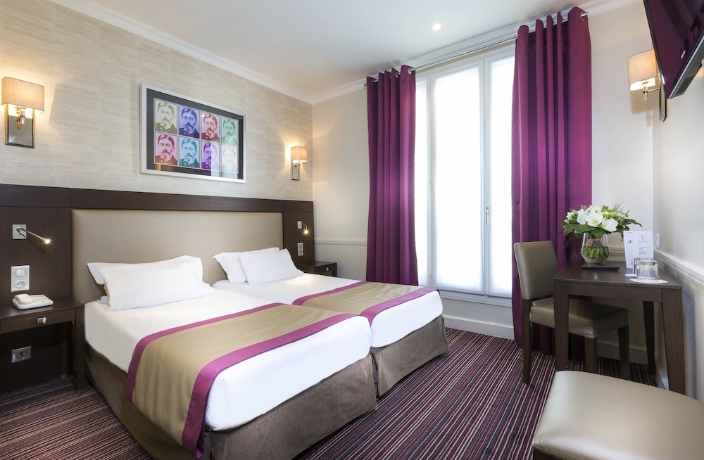 Habitación con 2 camas individuales del hotel Elysees Union