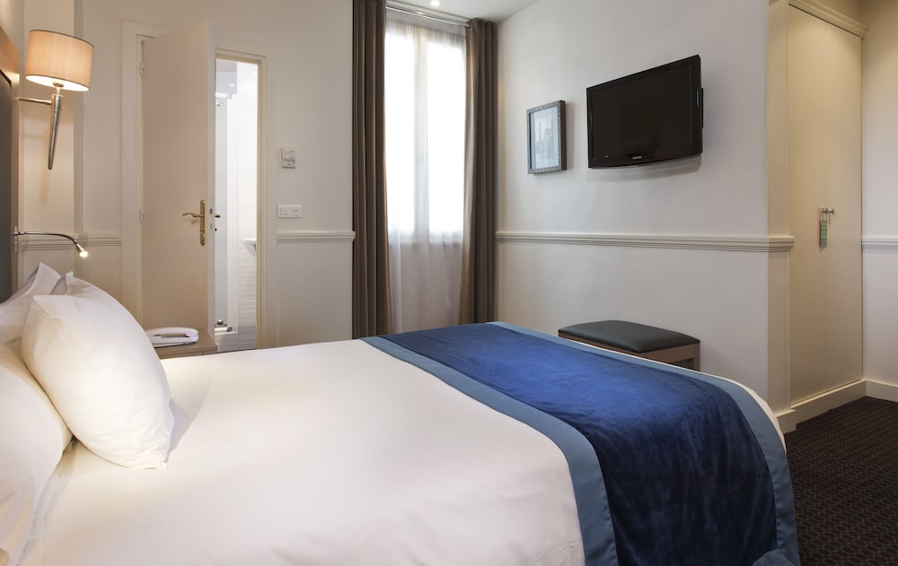 Habitación individual del hotel Elysees Union. Foto 3