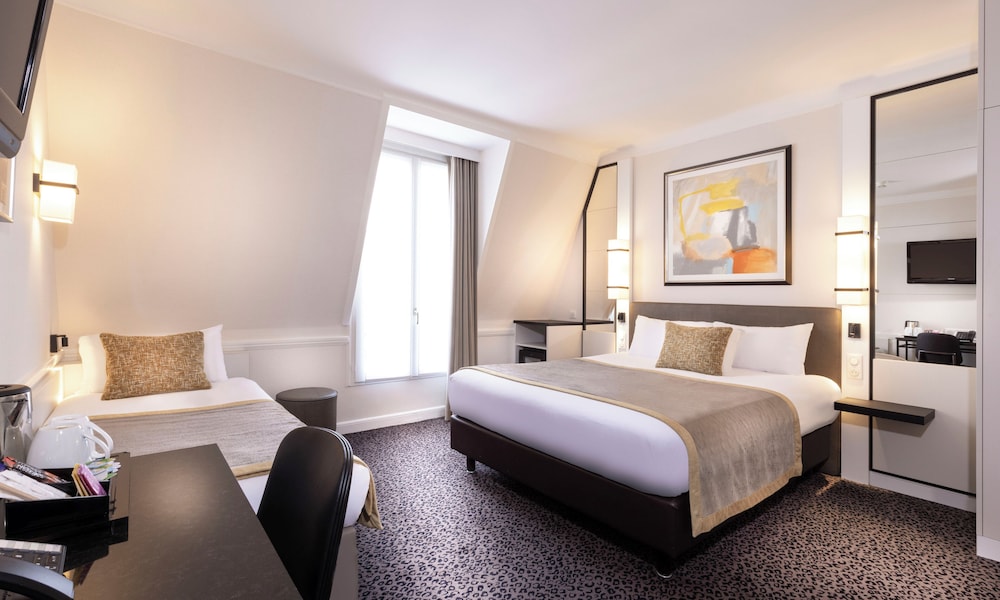 Habitación triple del hotel Elysees Union