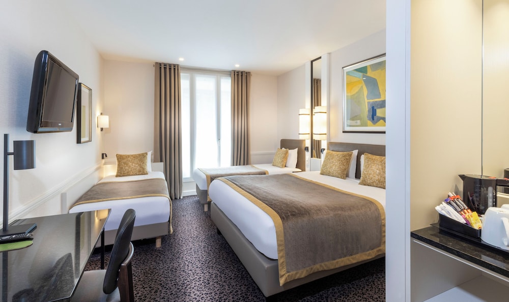 Habitación cuádruple del hotel Elysees Union