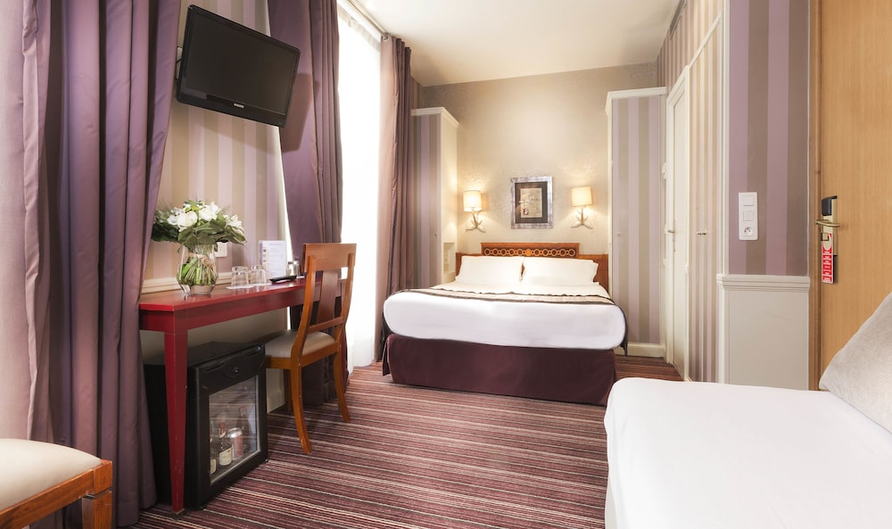 Habitación cuádruple del hotel Elysees Union. Foto 2