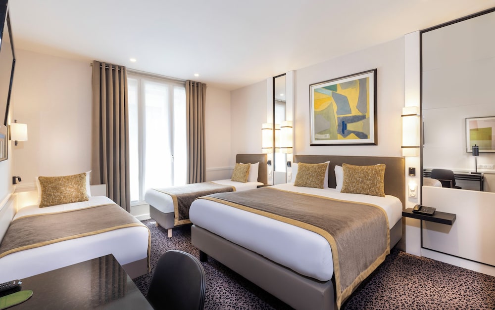 Habitación cuádruple del hotel Elysees Union. Foto 5