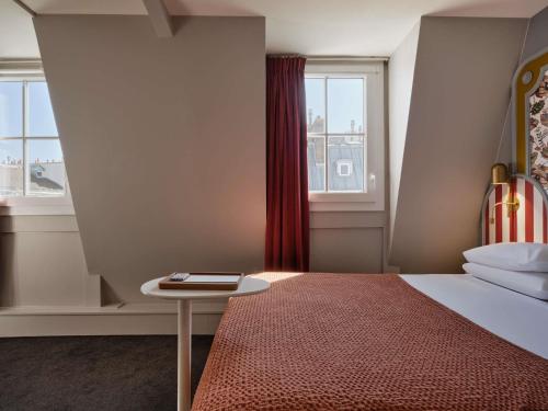 Habitación Doble Privilege del hotel Mercure Paris Notre Dame Saint Germain Des Prés. Foto 2