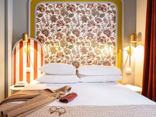 Habitación Doble Clásica del hotel Mercure Paris Notre Dame Saint Germain Des Prés. Foto 2