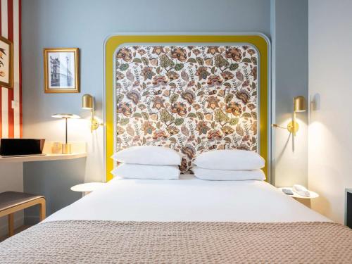 Habitación Doble Clásica del hotel Mercure Paris Notre Dame Saint Germain Des Prés. Foto 7