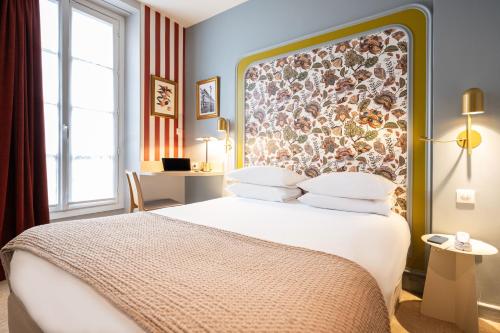 Habitación Doble Clásica del hotel Mercure Paris Notre Dame Saint Germain Des Prés. Foto 11