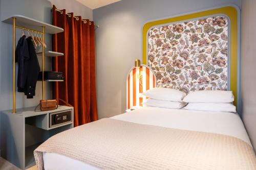 Habitación Doble Clásica del hotel Mercure Paris Notre Dame Saint Germain Des Prés. Foto 12