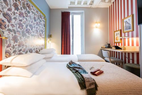 Habitación Doble Clásica - 2 camas del hotel Mercure Paris Notre Dame Saint Germain Des Prés. Foto 4