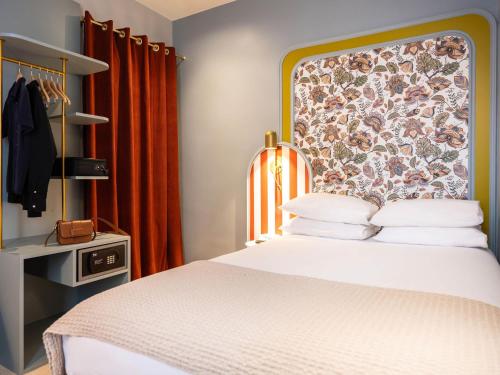 Habitación Individual Clásica del hotel Mercure Paris Notre Dame Saint Germain Des Prés. Foto 3