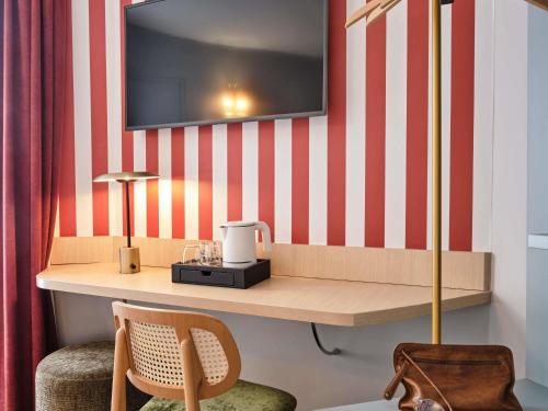 Habitación Individual Clásica del hotel Mercure Paris Notre Dame Saint Germain Des Prés. Foto 6