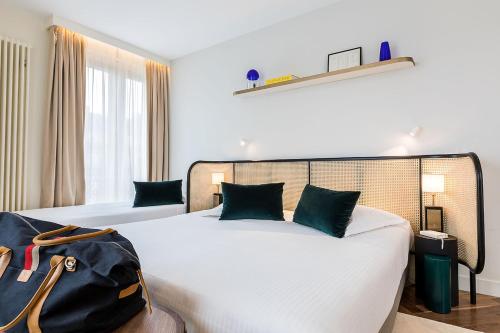 Habitación Triple Deluxe del hotel Le Friedland. Foto 4